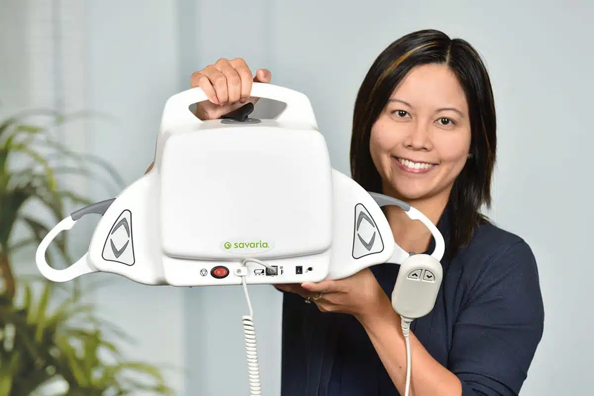 Savaria Portable Ceiling Lift PL holding 1200x800